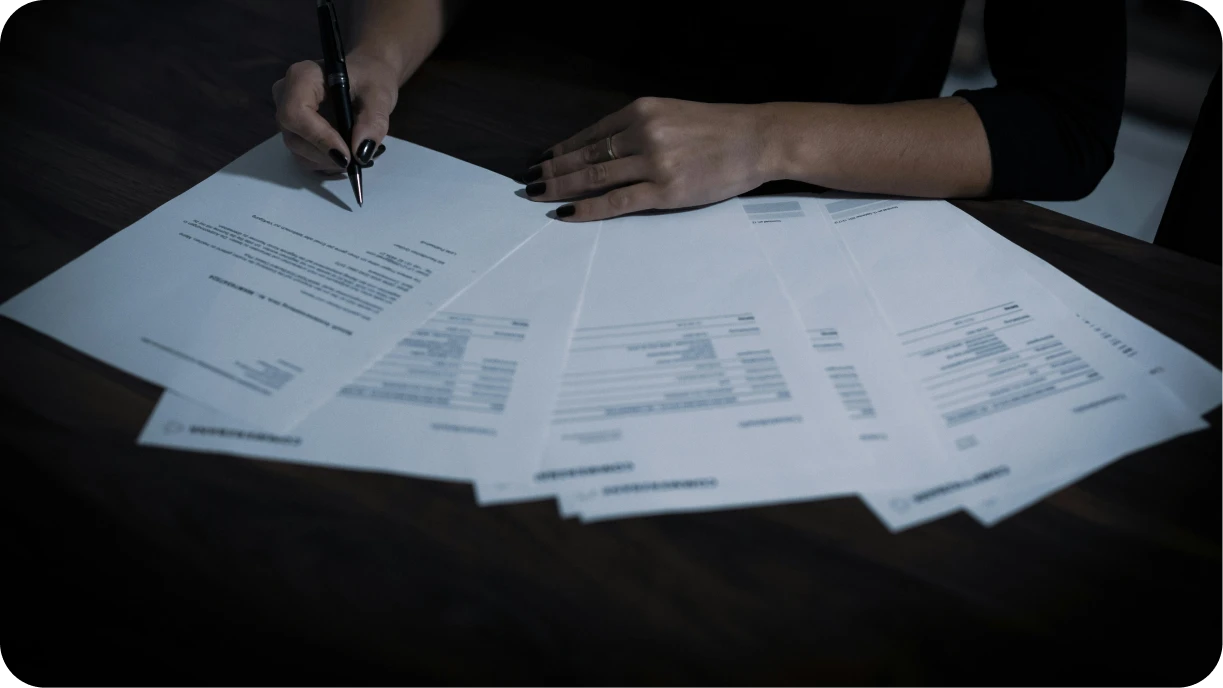 Stressed business owner with papers and spreadsheets versus organized owner using digital tools